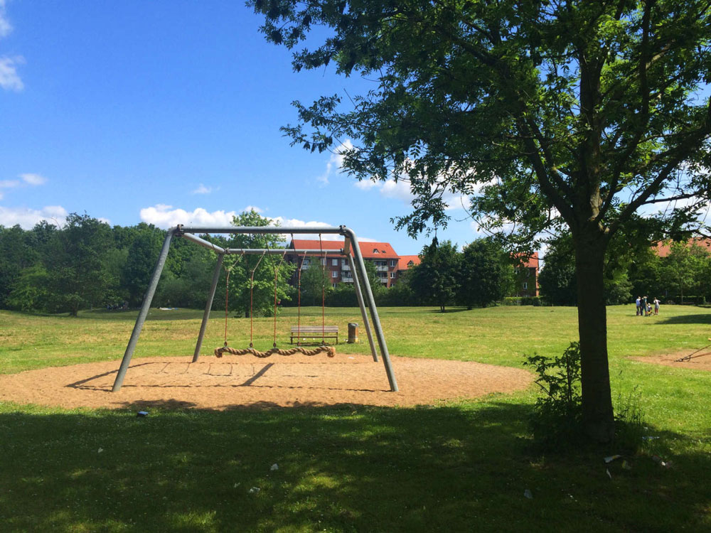 A lot of playgrounds, forest and green.